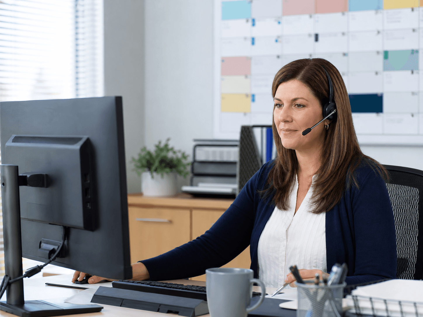 Office manager organizing incoming customer requests